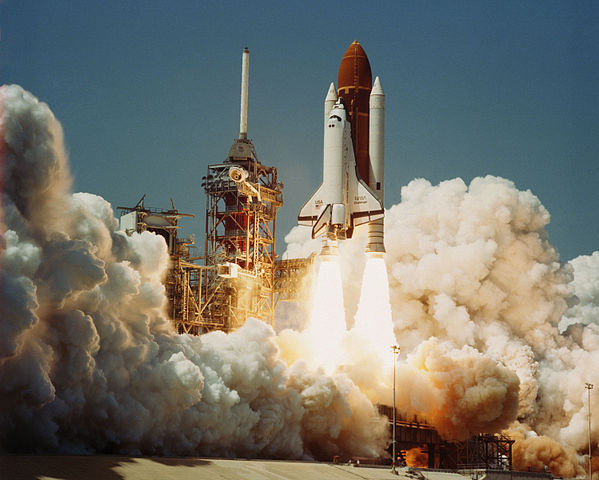 The Space Shuttle Challenger lifting off for its first space mission
