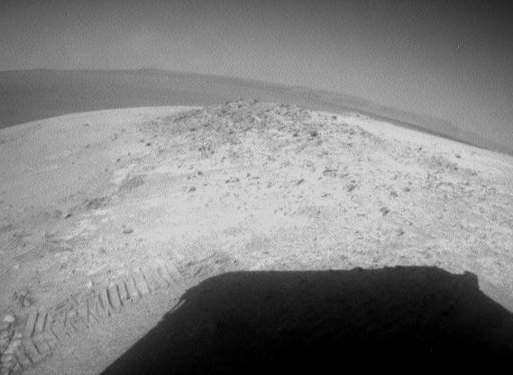 View of Greeley Haven captured by the Mars Rover Opportunity. The shadow is caused by the solar panel (Photo NASA/JPL-Caltech)