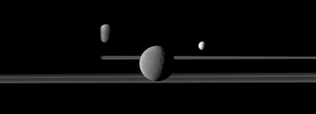 Saturn's rings and its satellites Dione, Rhea and Enceladus photographed by the Cassini space probe (Photo NASA/JPL/Space Science Institute)