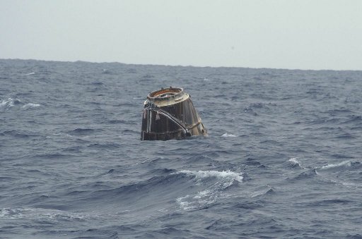 The SpaceX Dragon spacecraft after splashing down into the Pacific Ocean (Photo Mike Altenhofen/SpaceX)
