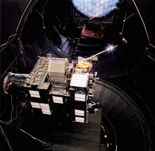The Rosetta space probe during a test in the Large Space Simulator (Photo ESA–A. Van der Geest)