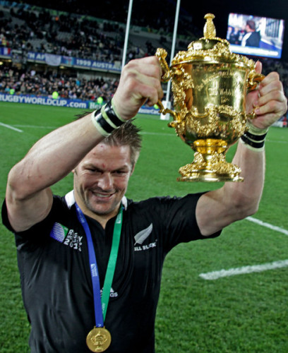 Richie McCaw holding the Webb Ellis Cup given to the Rugby World Cup winners