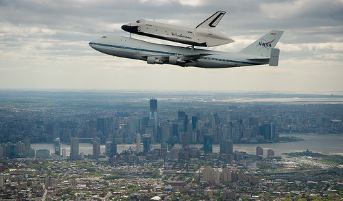 The Space Shuttle Enterprise atop the Shuttle Carrier Aircraft over Manhattan, New York (Photo NASA/Robert Markowitz)