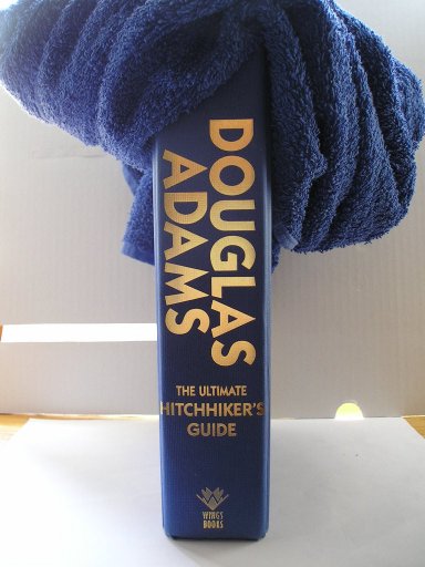The Ultimate Hitchhiker's Guide To The Galaxy by Douglas Adams contains the five classic novels from The Hitchhiker's Guide to the Galaxy series. The Towel is not included
