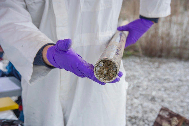 Charles Paradis with a soil core sample (Photo courtesy Lance E. King/Y-12 National Security Complex. All rights reserved)
