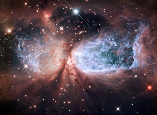 A forming star in the Sharpless 2-106 nebula (Image NASA, ESA, and the Hubble Heritage Team (STScI/AURA))