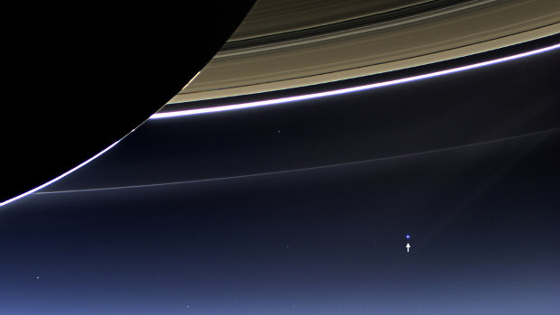 Earth and Moon seen as a single dot from Saturn in a picture taken by the Cassini space probe (Photo NASA/JPL-Caltech/Space Science Institute)